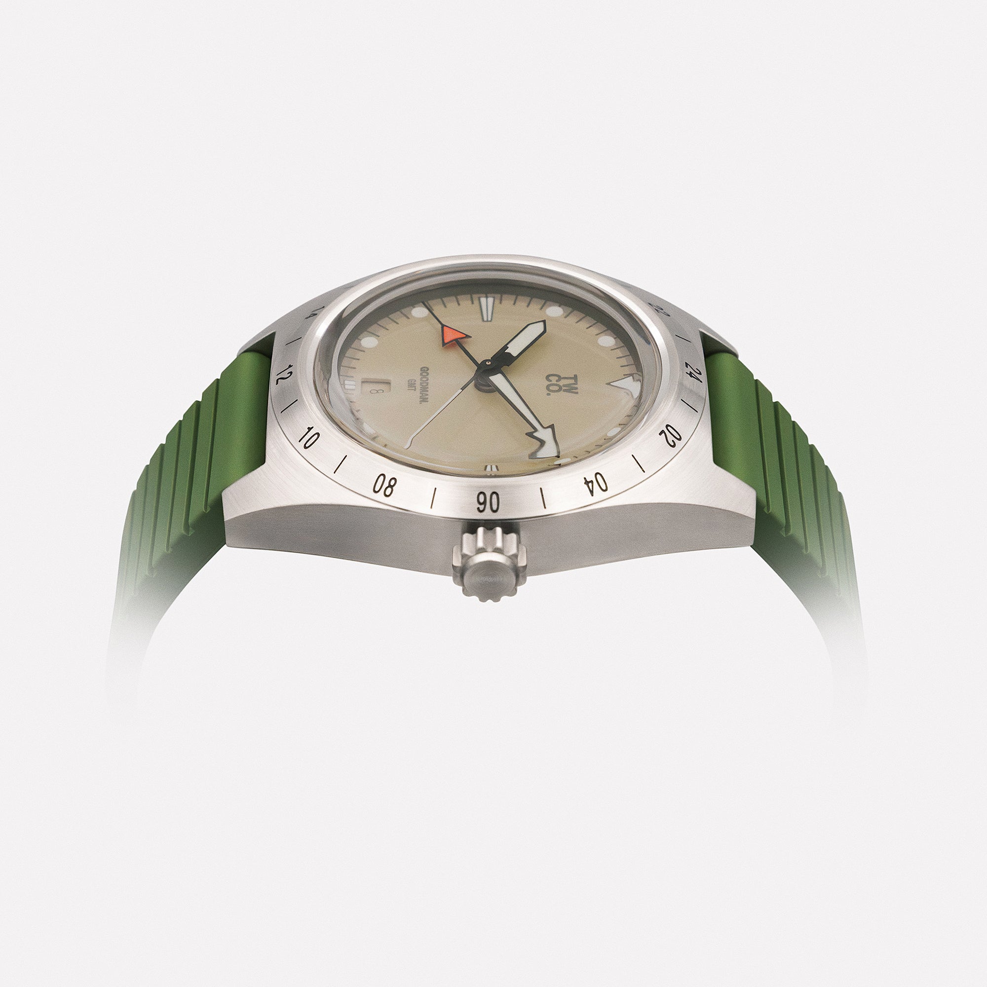 Goodman GMT Utility case profile showing brushed steel finish and box acrylic crystal